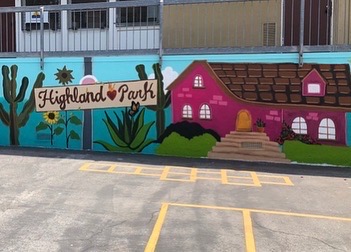Image of a mural made during the Yorkdale Elementary Mural Project. The mural shows a pink house with a blue background.